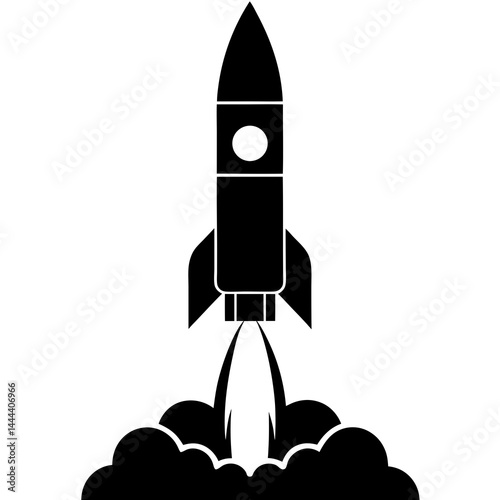 Silhouette of a rocket launching with smoke clouds and exhaust on a launch pad
