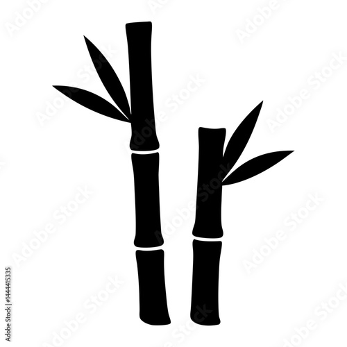 Silhouette of two bamboo stalks with leaves against a white background