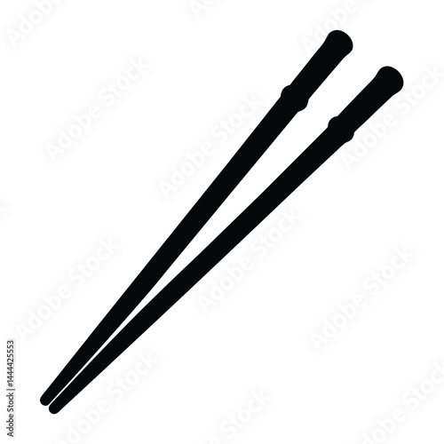 A pair of black chopsticks diagonally presented on a white background image