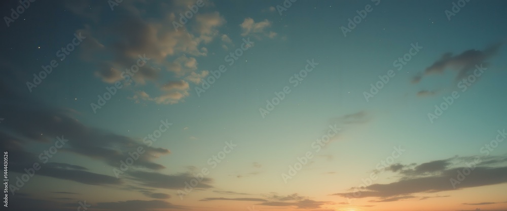 Tranquil Sky at Sunset with Gentle Clouds and Faint Stars in a Serene Twilight Landscape