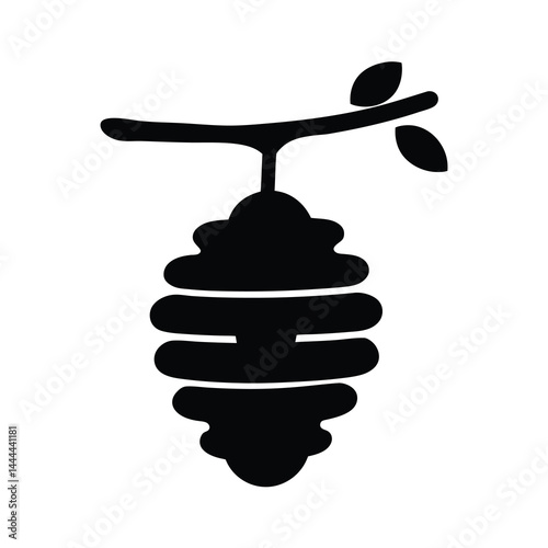 Silhouette of a beehive hanging from a branch with leaves, black and white