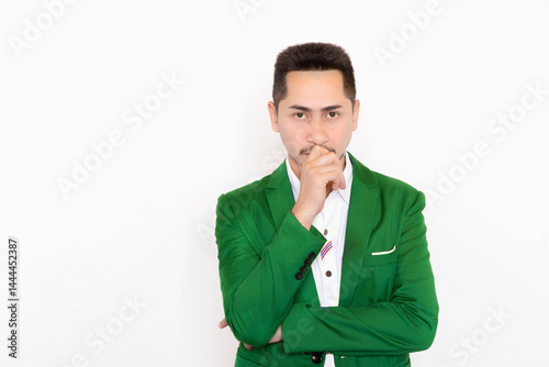 Portrait of young businessman thinking on white background