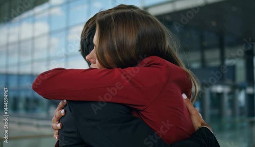 A couple sharing an emotional goodbye at the airport departure gate before parting ways and traveling to different places