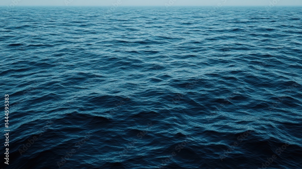 Obraz premium Expansive, deep blue ocean surface, tranquil and vast.