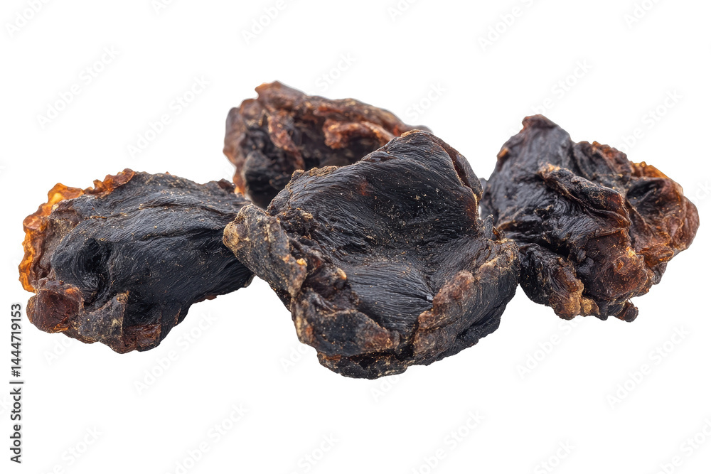 Authentic black Mumiyo chunks isolated on white background ideal for Ayurvedic medicine or traditional healing graphics Authentic black Mumiyo chunks isolated on white background ideal for Ayurvedic medicine or traditional healing graphics