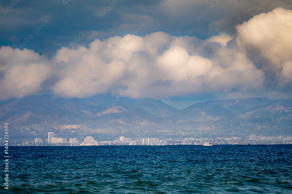 Inland angle of coastal section of the South Bay, Southern California with dramatic blue and cloudy sky