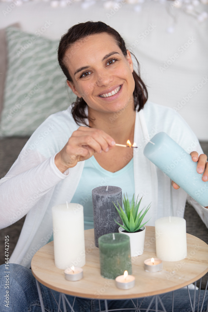 beautiful woman doing aromatherapy at home