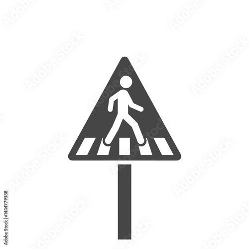 Pedestrian Crossing Sign: A bold, triangular pedestrian crossing sign prominently displayed on a pole, alerting drivers to a designated walkway for people on foot.