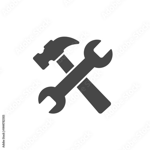 Tools of the Trade: A monochromatic image presents a hammer and wrench, classic icons symbolizing construction and repair, essential tools for various tasks.