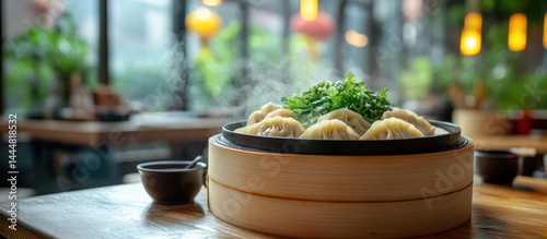 Obraz na płótnie Steamed dumplings in a bamboo steamer, restaurant interior w salonie