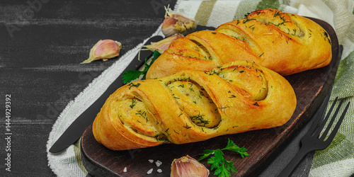 Fresh baked garlic bread, gluten free buns. Tasty food, fresh parsley, fragrant spices