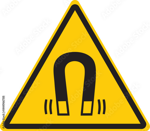 triangular warning sign with a magnet icon indicating strong magnetic fields in the area