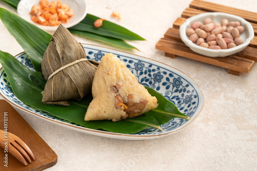 Zongzi, rice dumpling for Dragon Boat Festival on white table background. photo
