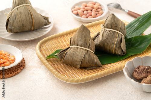 Zongzi, rice dumpling for Dragon Boat Festival on white table background. photo