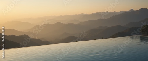 Serene mountain panorama with an infinity pool for stunning relaxation photo