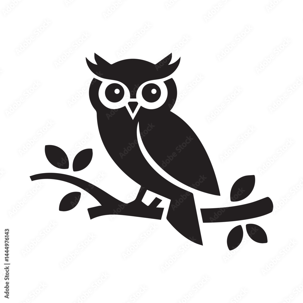 Obraz premium owl sitting on branch