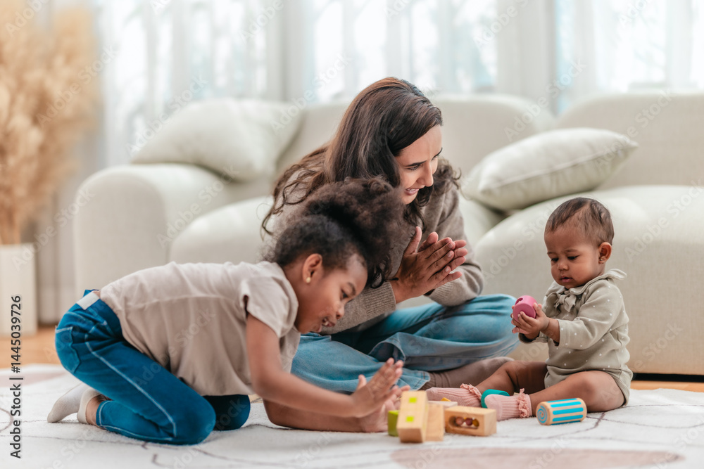 Happy Mother Playing with Daughters at Home. Happy Mother Playing with Daughters at Home.
