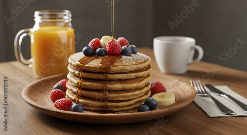 Pancakes Being Drizzled with Syrup and Berries Breakfast Still Life