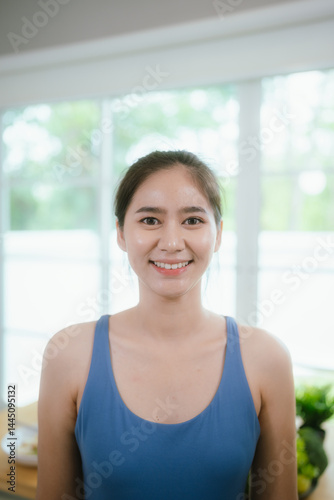 Young Asian woman in bright kitchen. Healthy colorful with fresh fruits and vegetables. Enjoying the vibrant lifestyle. Free Download Young Asian woman in bright kitchen. Healthy colorful with fresh fruits and vegetables. Enjoying the vibrant lifestyle. - GFXLoad