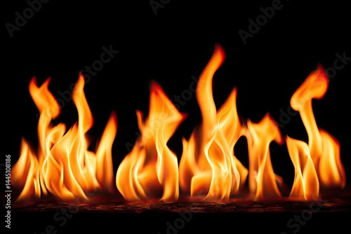 Fiery flames against black background