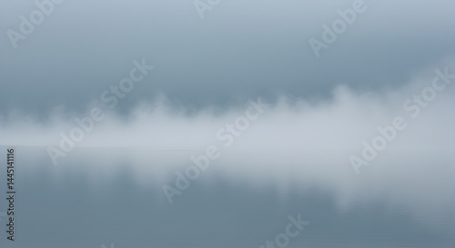 Misty lake scene, soft focus, light gray tones