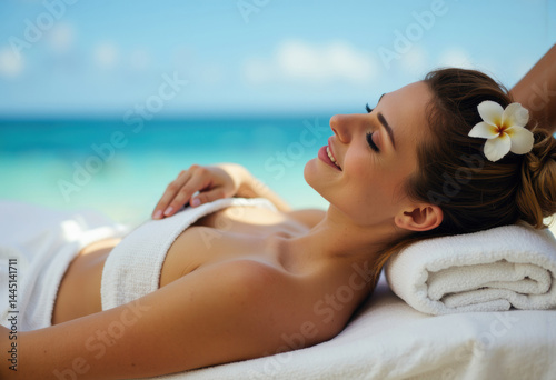 Relaxing woman enjoying a soothing massage by the beach
