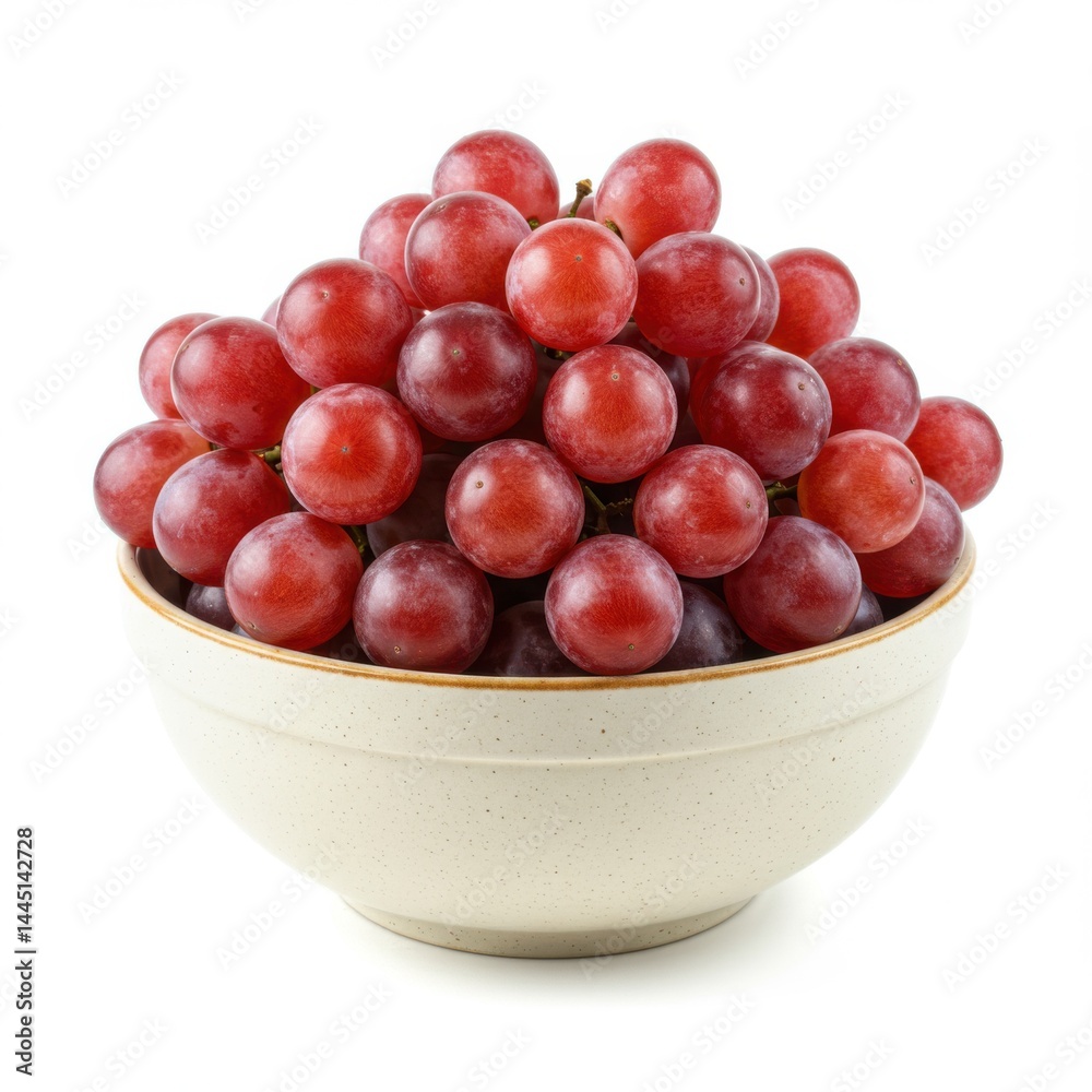 A bowl overflowing with ripe red grapes on a white background in a studio setting and good lighting A bowl overflowing with ripe red grapes on a white background in a studio setting and good lighting