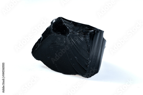 Obraz na płótnie Natural Black Volcanic Obsidian Stone Fragment Isolated on White Background w salonie