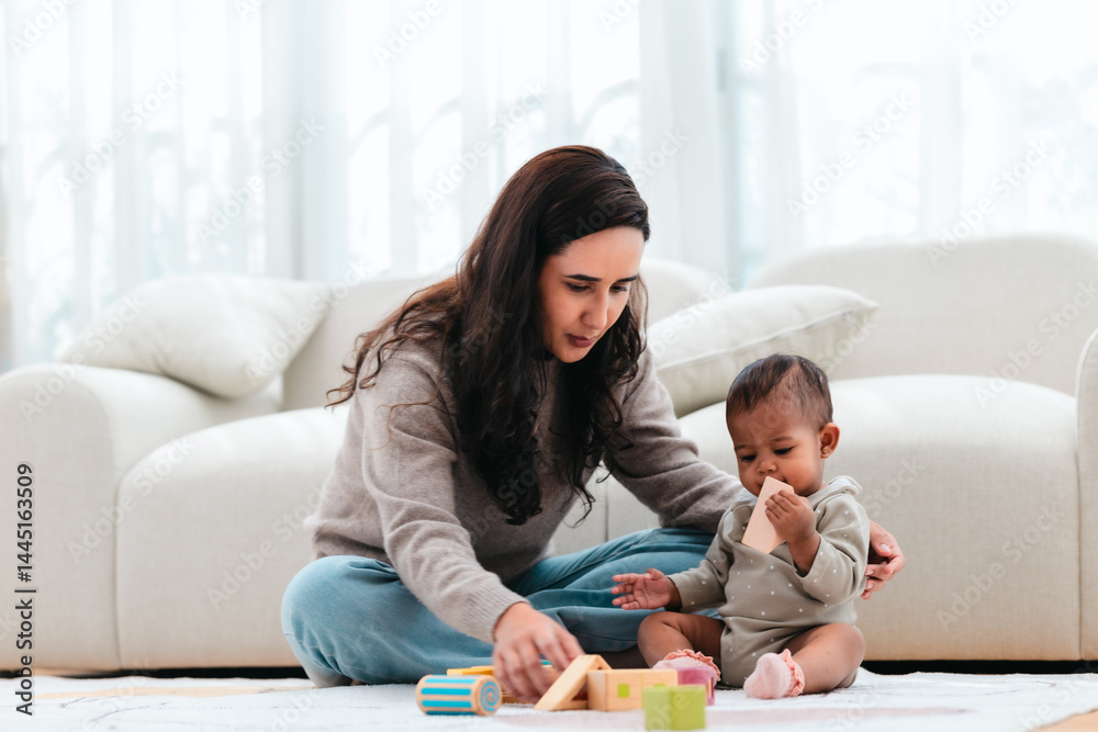 Happy Mother Playing with Daughters at Home. Happy Mother Playing with Daughters at Home.