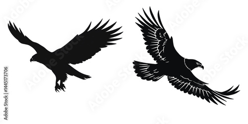 Two silhouette eagles soaring majestically with outstretched wings wide