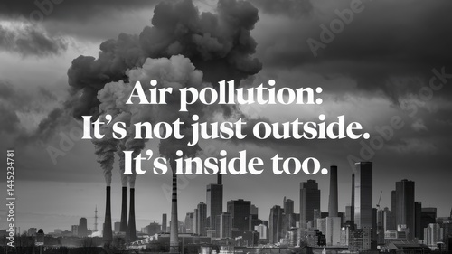 Polluted city skyline with smokestacks and heavy gray smoke in grayscale image photo