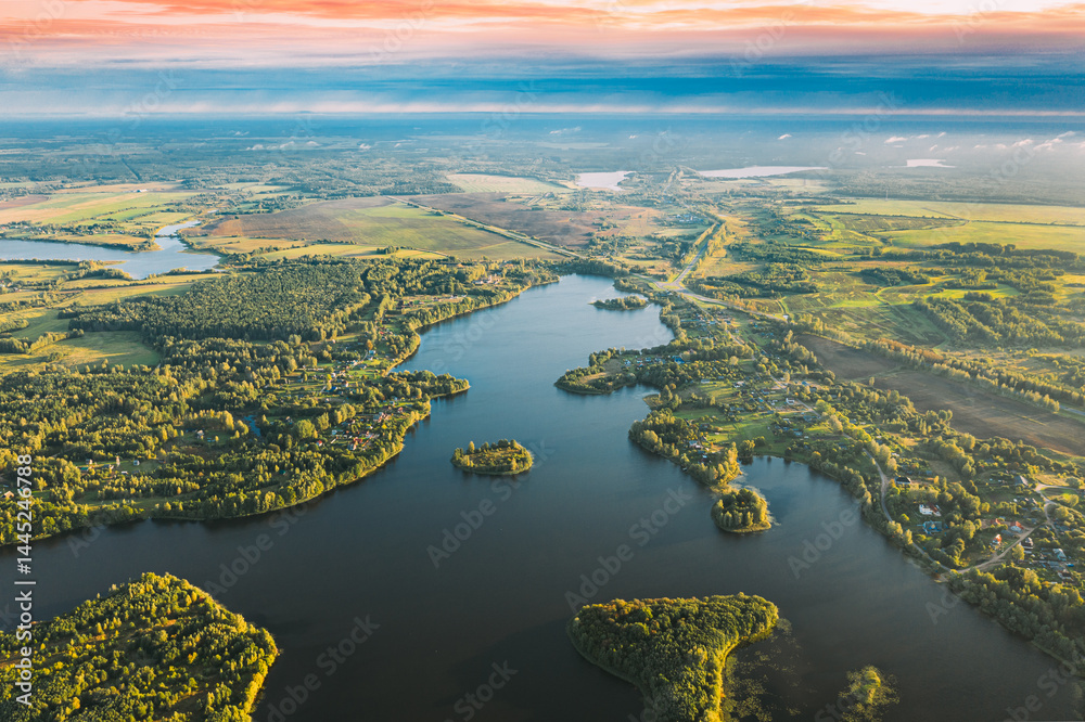Lyepyel, Lepel Lake, Beloozerny District, Vitebsk Region. Aerial View Of Lyepyel Cityscape Skyline In Autumn Morning. Morning Fog Above Lepel Lake. Top View Of European Nature From High Attitude In