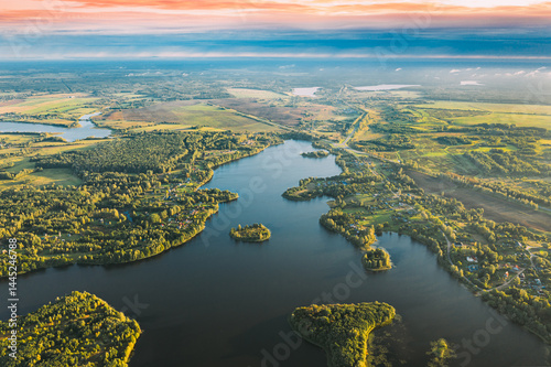 Obraz na płótnie Lyepyel, Lepel Lake, Beloozerny District, Vitebsk Region. Aerial View Of Lyepyel Cityscape Skyline In Autumn Morning. Morning Fog Above Lepel Lake. Top View Of European Nature From High Attitude In w salonie