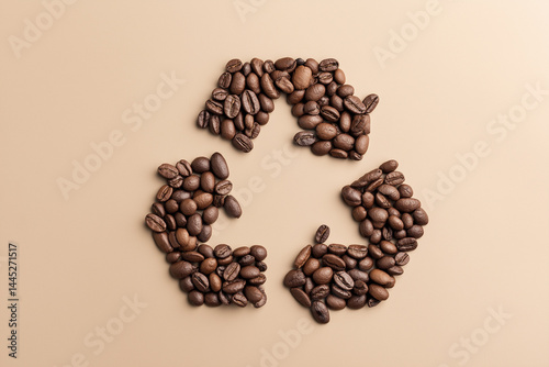 recycling symbol made from coffee bean on beige background