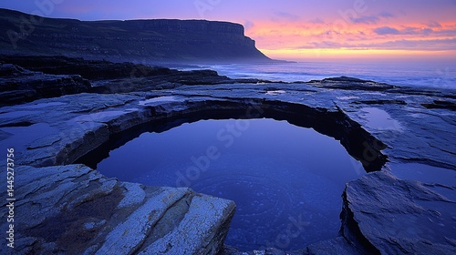 Coastal rock pool at sunset