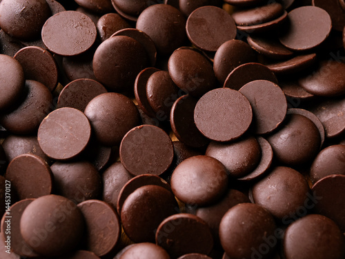 Dark Chocolate COUVERTURE chips Pistols buttons. Confection and pastry concept.