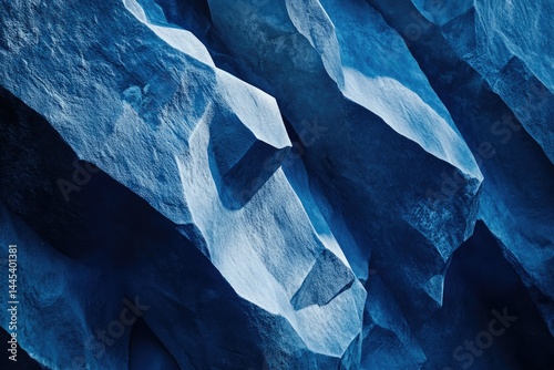 Wallpaper Mural Abstract close-up of deep blue textured rock formations, showcasing sharp angles and shadows. Torontodigital.ca