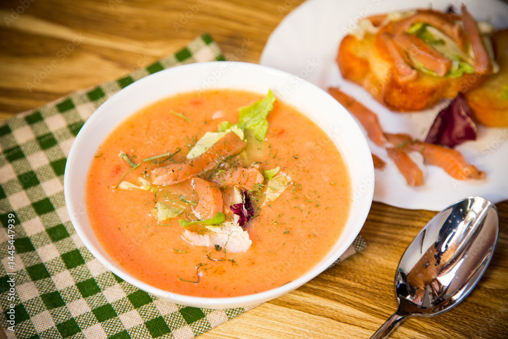 Healthy and delicate cream soup of red fish with dill Healthy and delicate cream soup of red fish with dill