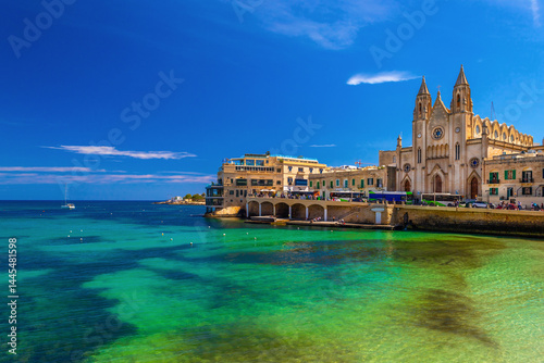 Obraz na płótnie Picturesque view of the Knisja tal-Karmnu and turquise-green water in St. Julian's Bay in Sliema, Malta w salonie