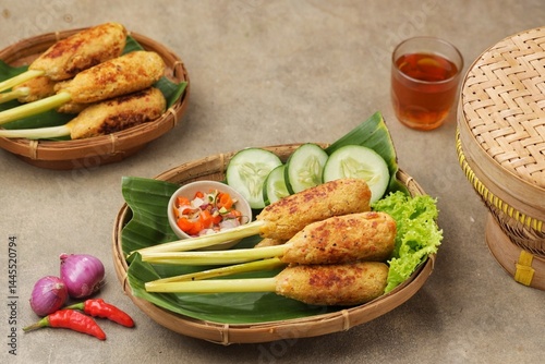 Sate Lilit is a variant of satay from Bali. This satay is made from pork, fish, chicken or beef, then mixed with grated coconut, coconut milk, lime, shallots and pepper.