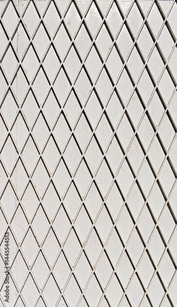 Grid on white metal surface in Tijuca neighborhood, Rio, Brazil