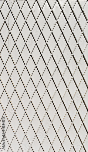 Obraz na płótnie Grid on white metal surface in Tijuca neighborhood, Rio, Brazil w salonie