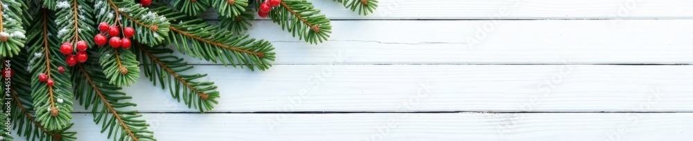 Fototapeta premium Fir branches with snowfall on wooden white background, festive atmosphere, White Background, Wood, Fir Branches