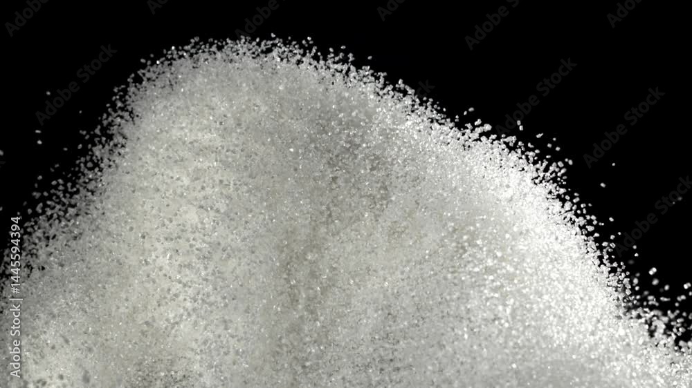 Sugar flies up and down. Filmed on a high-speed camera at 1000 fps. High quality FullHD footage Sugar flies up and down. Filmed on a high-speed camera at 1000 fps. High quality FullHD footage