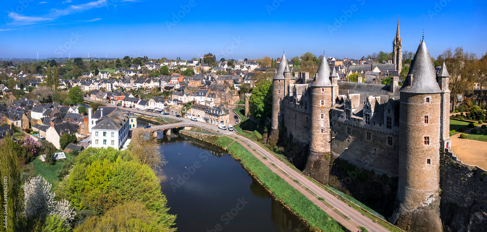 France most beautiful medieval castles - Josselin , scenic fortress and old village in Morbihan department of Brittany. aerial drone panoramic view