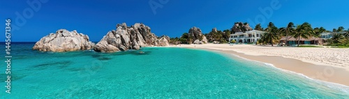 Beautiful tropical beach scene with ocean and large rock formations