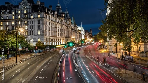 Nighttime Cityscape View of Historic Buildings and Busy Traffic Scene