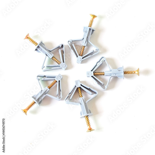 Grey Butterfly type plastic dowel on white background. photo