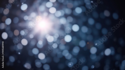 Abstract Blue Bokeh Background with Bright Central Light Source and Glowing Particles