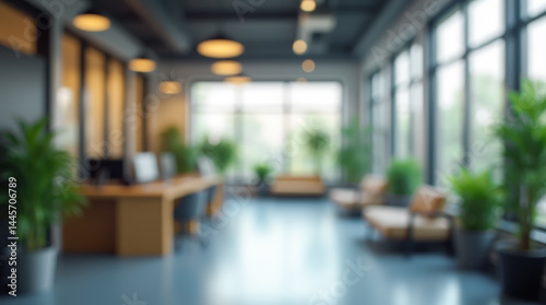 Bright and spacious hotel or office lobby with a blurred perspective, featuring a contemporary reception area and large glass windows.